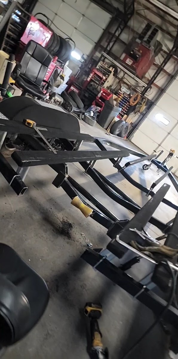 Interior of workshop with trailer frame
